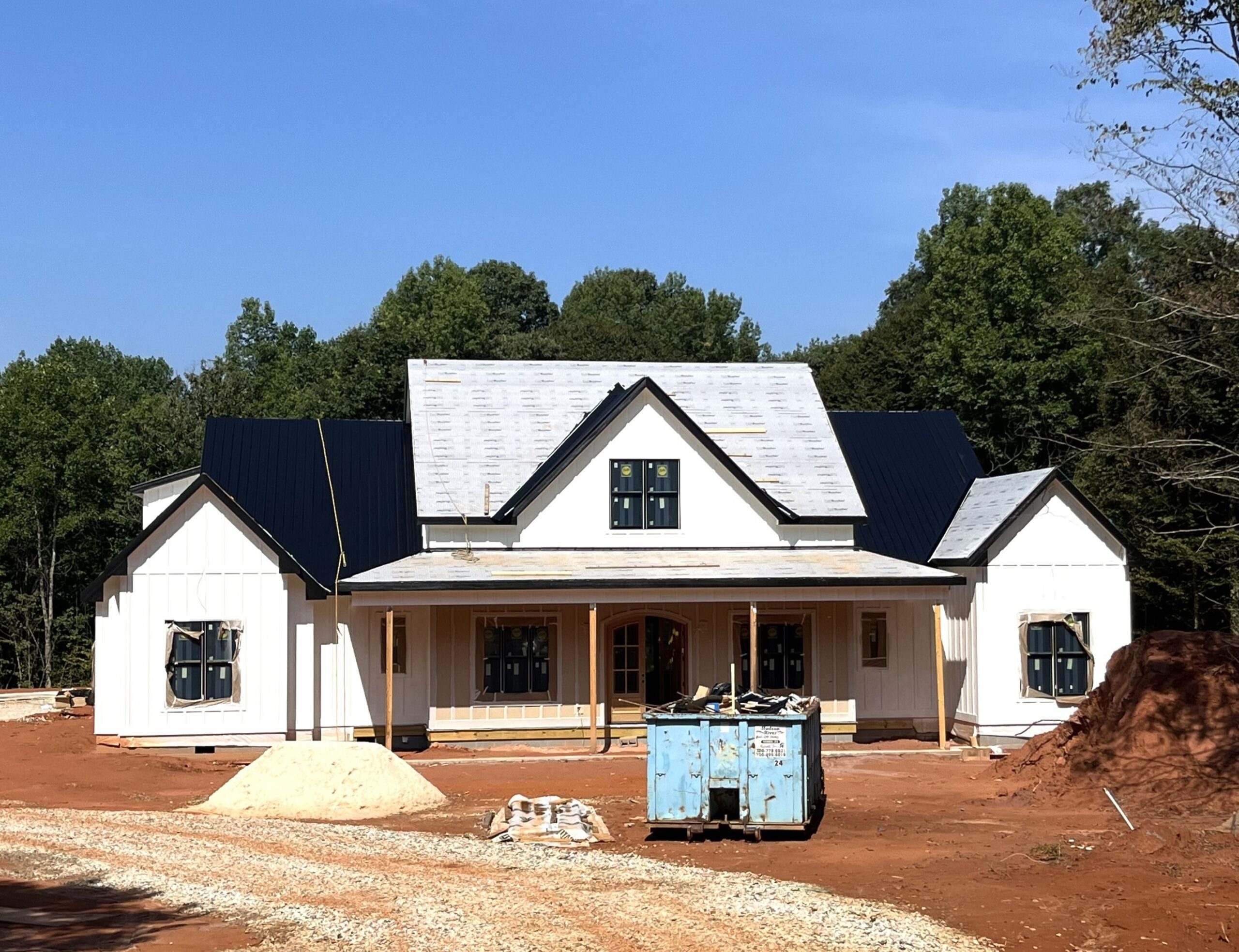 The front of a custom home being built by Premier Builders.